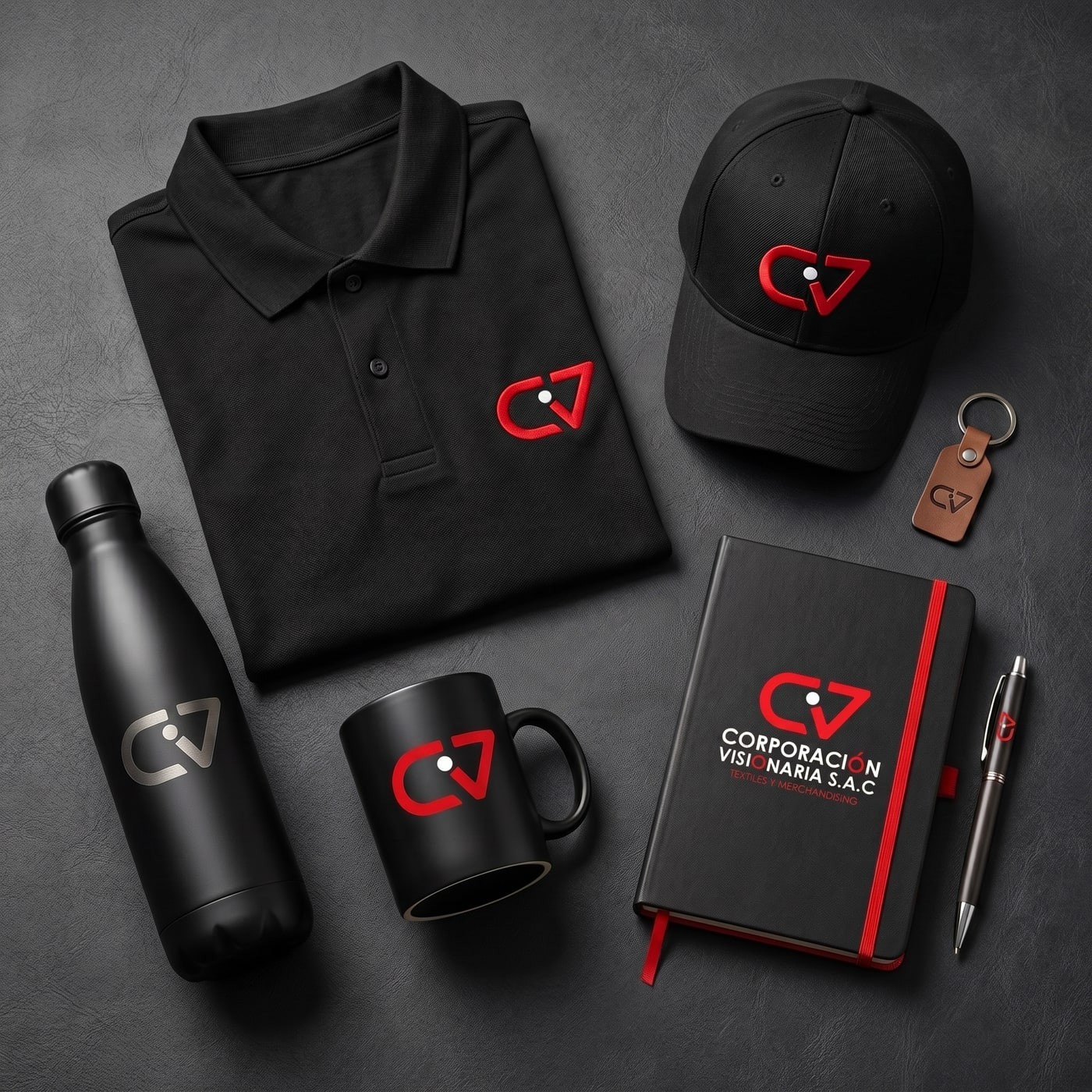 Kit de merchandising Corporación Visionaria: polo, gorra, tomatodo, taza, libreta y llavero con logo